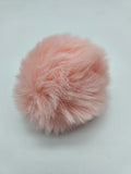 Pompón de acrílico