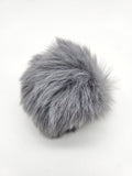 Pompón de acrílico